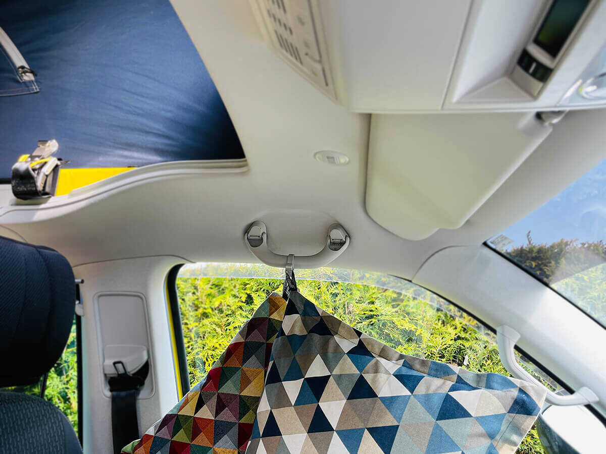 The coat hook for the grab rail: Busstoff® GRIFFIG